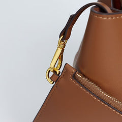 IT Ozzy Bag | Modern Chic Leather Shoulder Bucket Bag with Amber Acrylic Handles