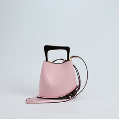 IT Ozzy Bag | Modern Chic Leather Shoulder Bucket Bag with Amber Acrylic Handles