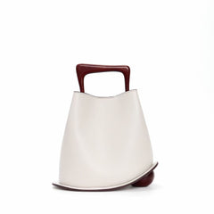 IT Ozzy Bag | Modern Chic Leather Shoulder Bucket Bag with Amber Acrylic Handles