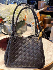 Noir Woven Lambskin Leather Shoulder Bag with Braided Handle and Gold Accents